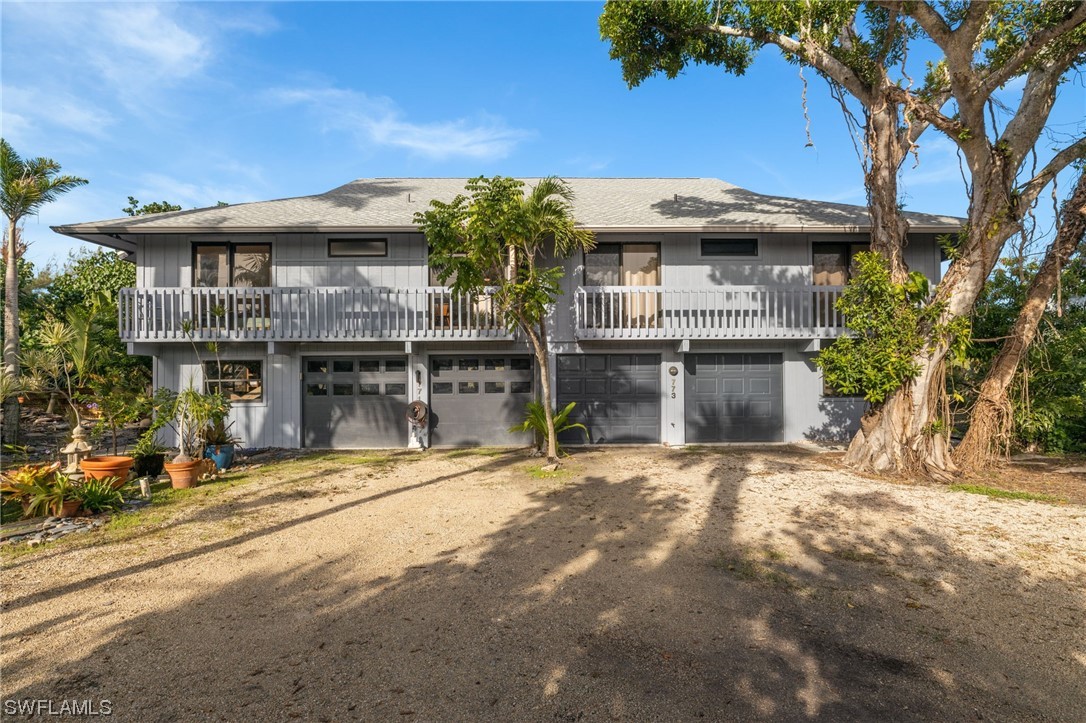 771 Rabbit Road Sanibel, FL 33957 - Photo 33 of 39 a view of a building with a outdoor space