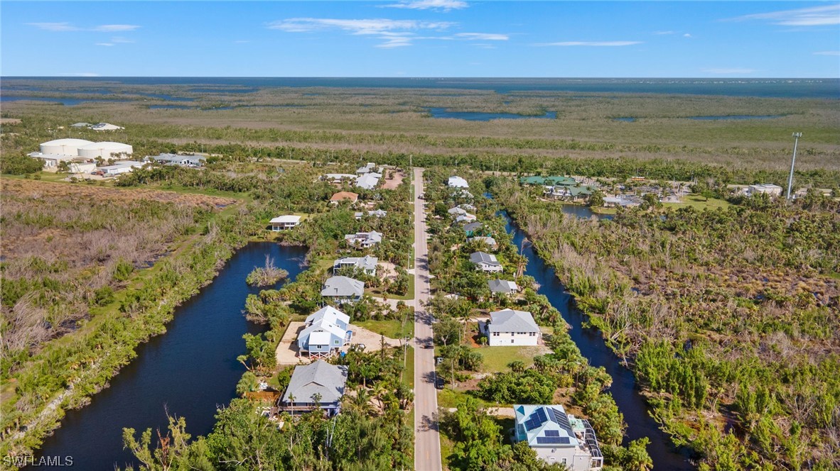 771 Rabbit Road Sanibel, FL 33957 - Photo 37 of 39 a view of an ocean and beach