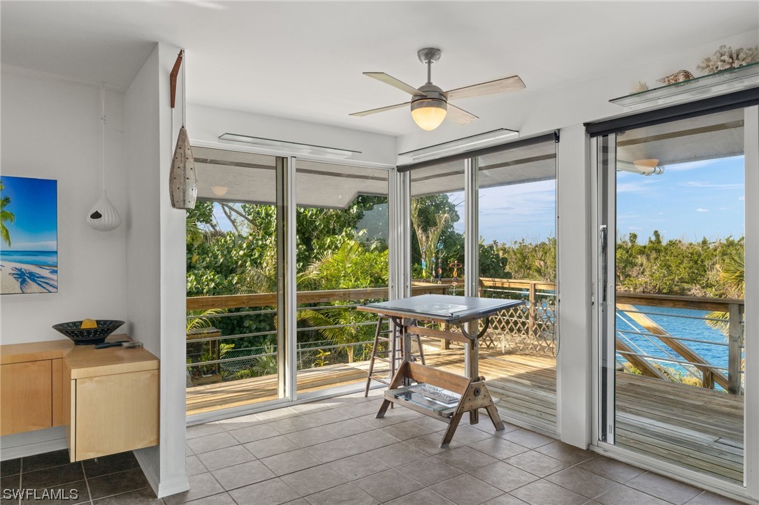 771 Rabbit Road Sanibel, FL 33957 - Photo 6 of 39 a view of a dining room with furniture window and outside view