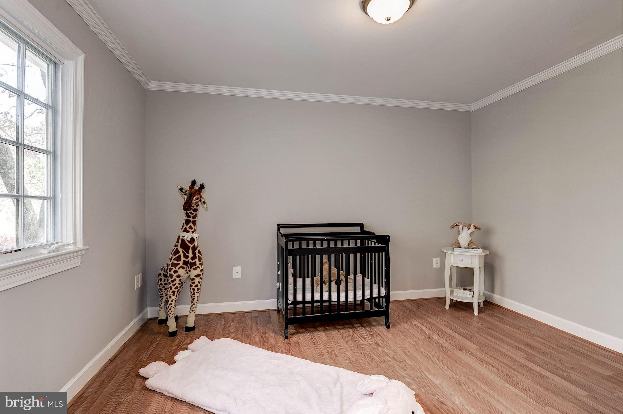 1048 Bellview Road McLean, VA 22102 - Photo 21 of 28 Upstairs bedroom with hardwood floor