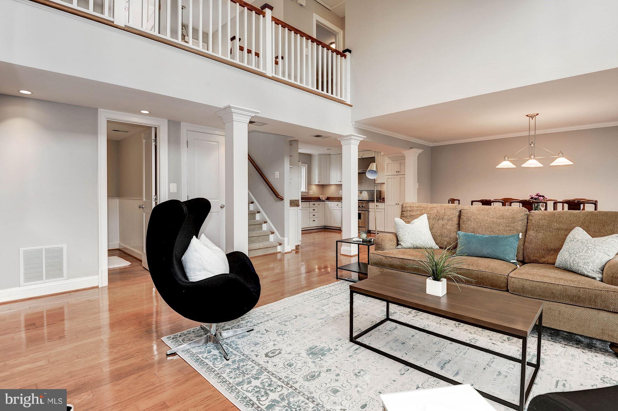 Open family room with hardwood floors