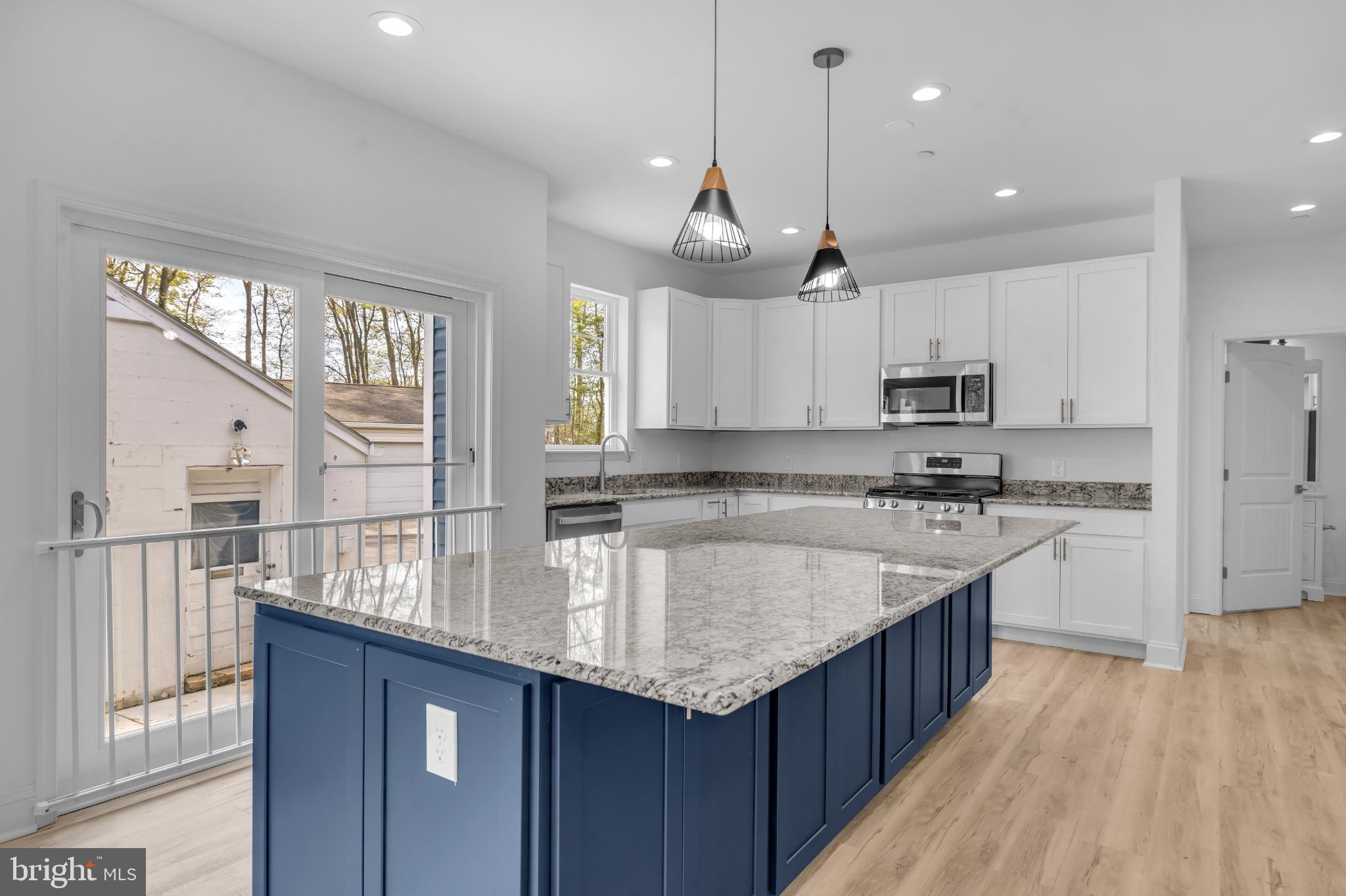 413 Trimble Road Joppa, MD 21085 - Photo 17 of 52 Modern kitchen with elegant granite island.