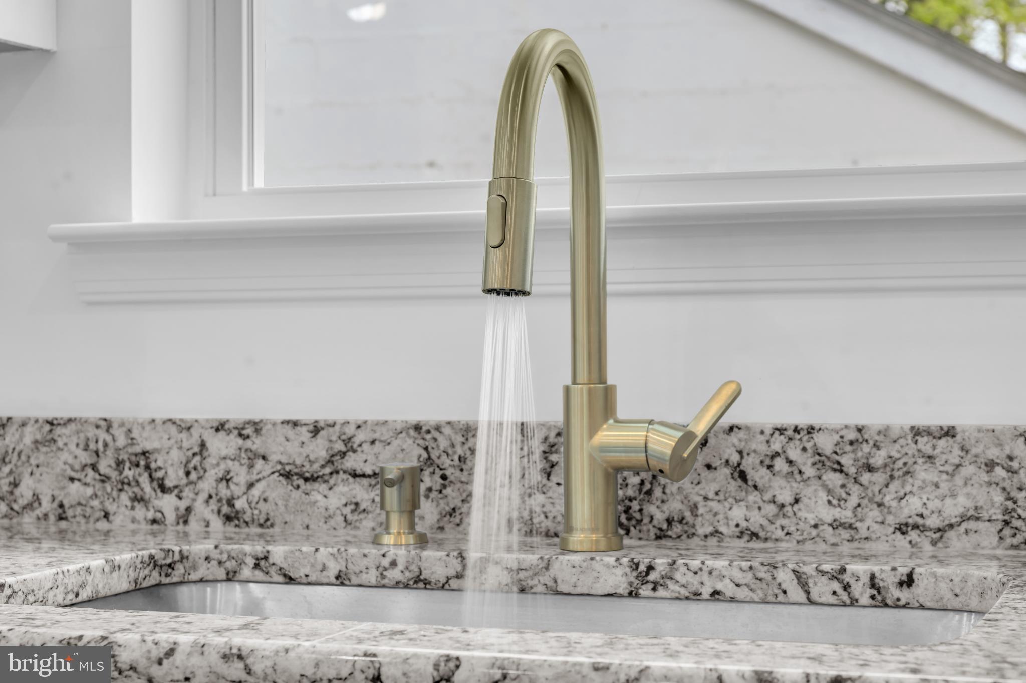 413 Trimble Road Joppa, MD 21085 - Photo 20 of 52 Sleek faucet over elegant granite countertop.