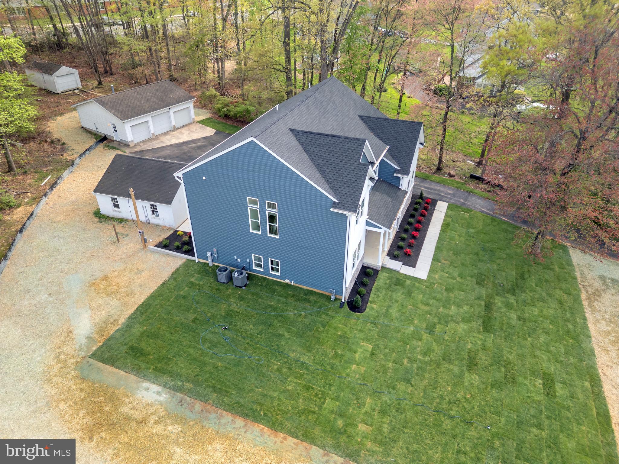 413 Trimble Road Joppa, MD 21085 - Photo 3 of 52 Modern home nestled in lush greenery.