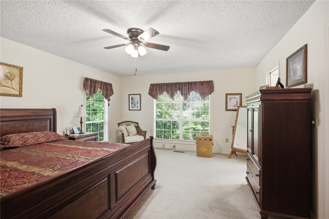 6 Tradewinds Way Salem, SC 29676 - Photo 49 of 50 This airy bedroom offers a comfortable retreat with ample natural light.