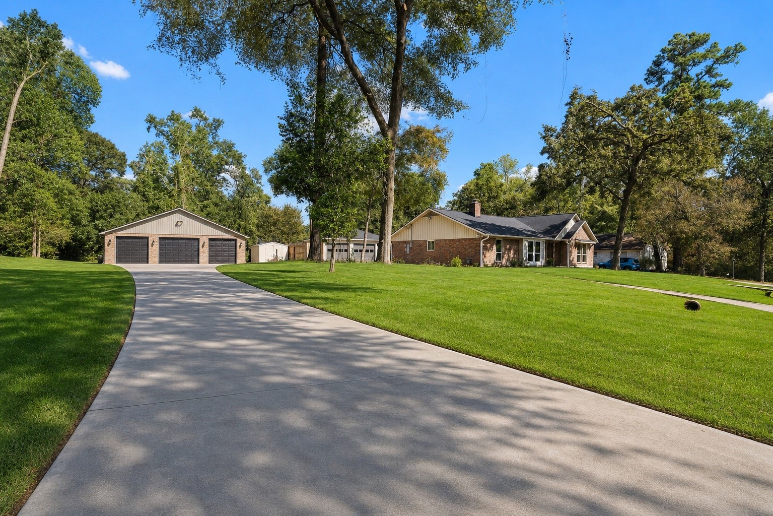 24714 Hunters Hollow Drive Spring, TX 77380 - Photo 5 of 39 a backyard of a house with table and chairs