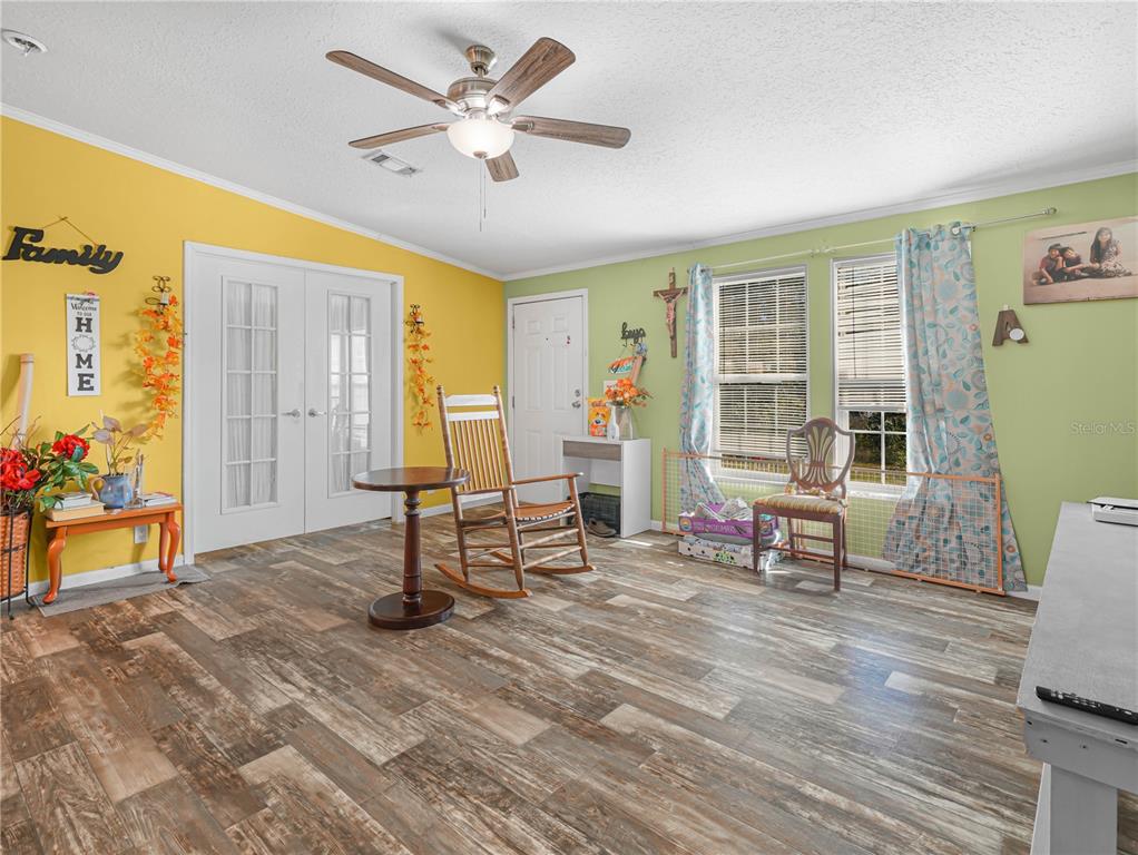 12524 Rockridge Road Lakeland, FL 33809 - Photo 7 of 10 a living room with furniture and a window