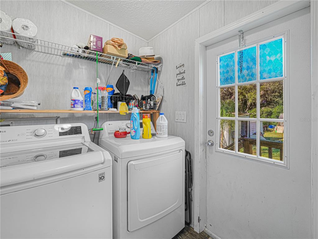 12524 Rockridge Road Lakeland, FL 33809 - Photo 9 of 10 a utility room with dryer and washer