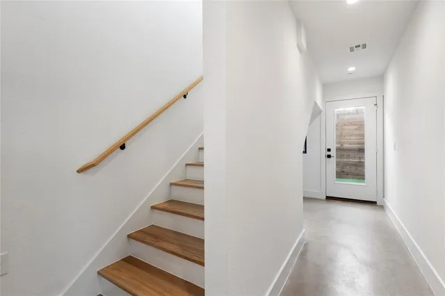 a view of an entryway with stairs