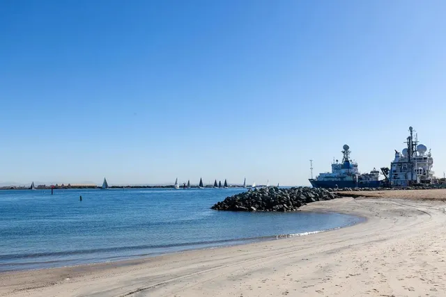a view of a livingroom with wooden floor