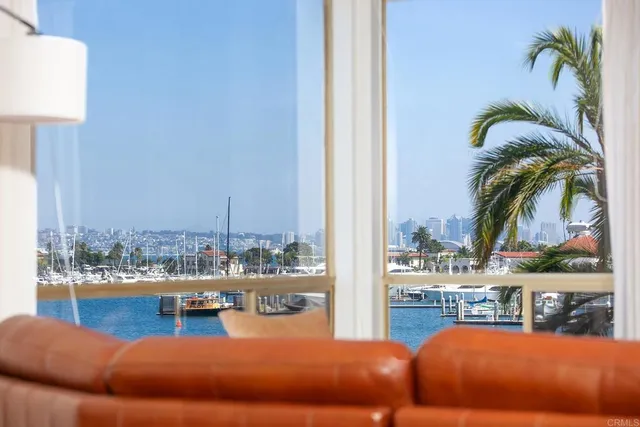 a view of a living room and dining room