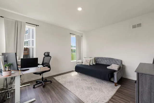 a living room with furniture and a couch