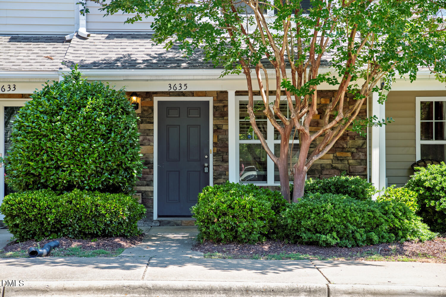 3635 Bison Hill Lane Raleigh, NC 27604 - Photo 1 of 18 front view of a house with a garden