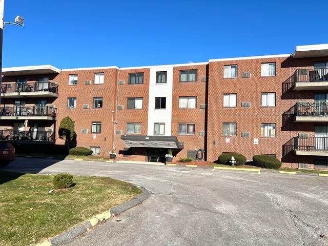 a view of building with a street