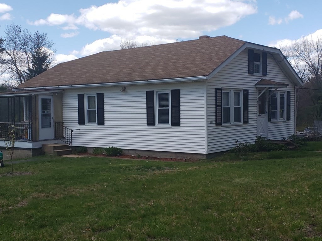 301 State Road Templeton, MA 01436 - Photo 3 of 18 a front view of a house with a garden