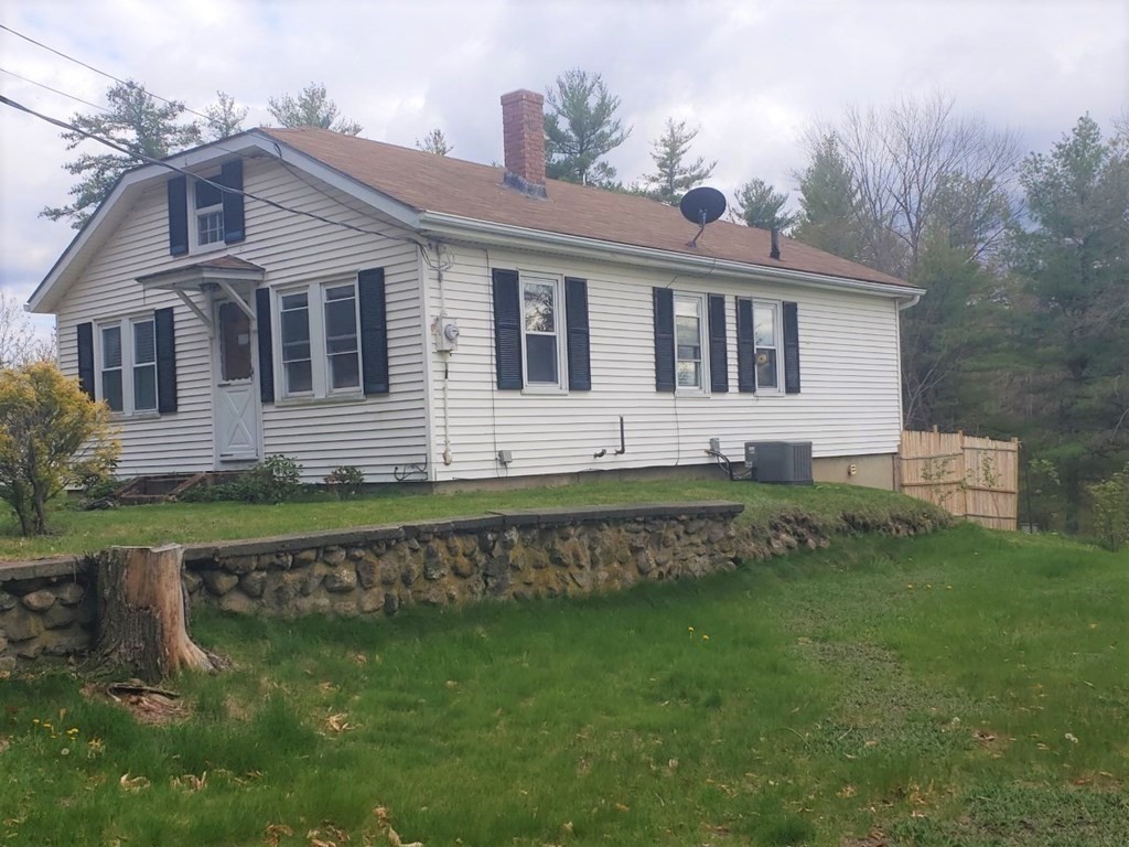 301 State Road Templeton, MA 01436 - Photo 4 of 18 a front view of a house with a garden