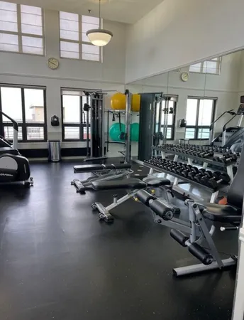 a view of a room with gym equipment
