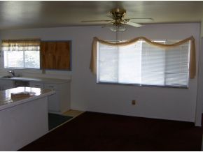 1354 Ne Port Palm Bay, FL 32905 - Photo 4 of 7 a bathroom with a sink a window and a mirror