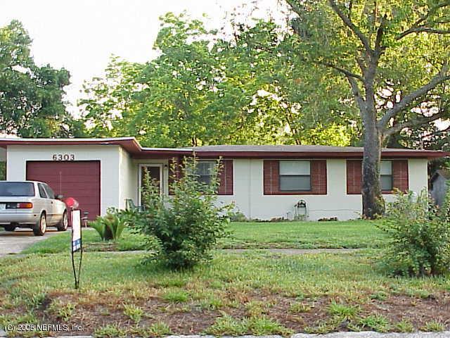 6303 Anvil Road Jacksonville, FL 32277 - Photo 1 of 1 a view of a house with a yard