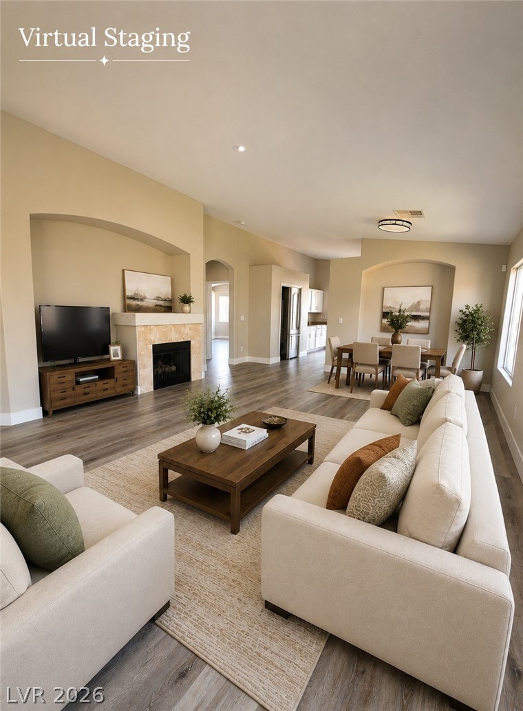 2278 Chestnut Ranch Avenue Henderson, NV 89052 - Photo 18 of 18 An inviting open floorplan seamlessly connects the living area, dining space, and a well-appointed kitchen.