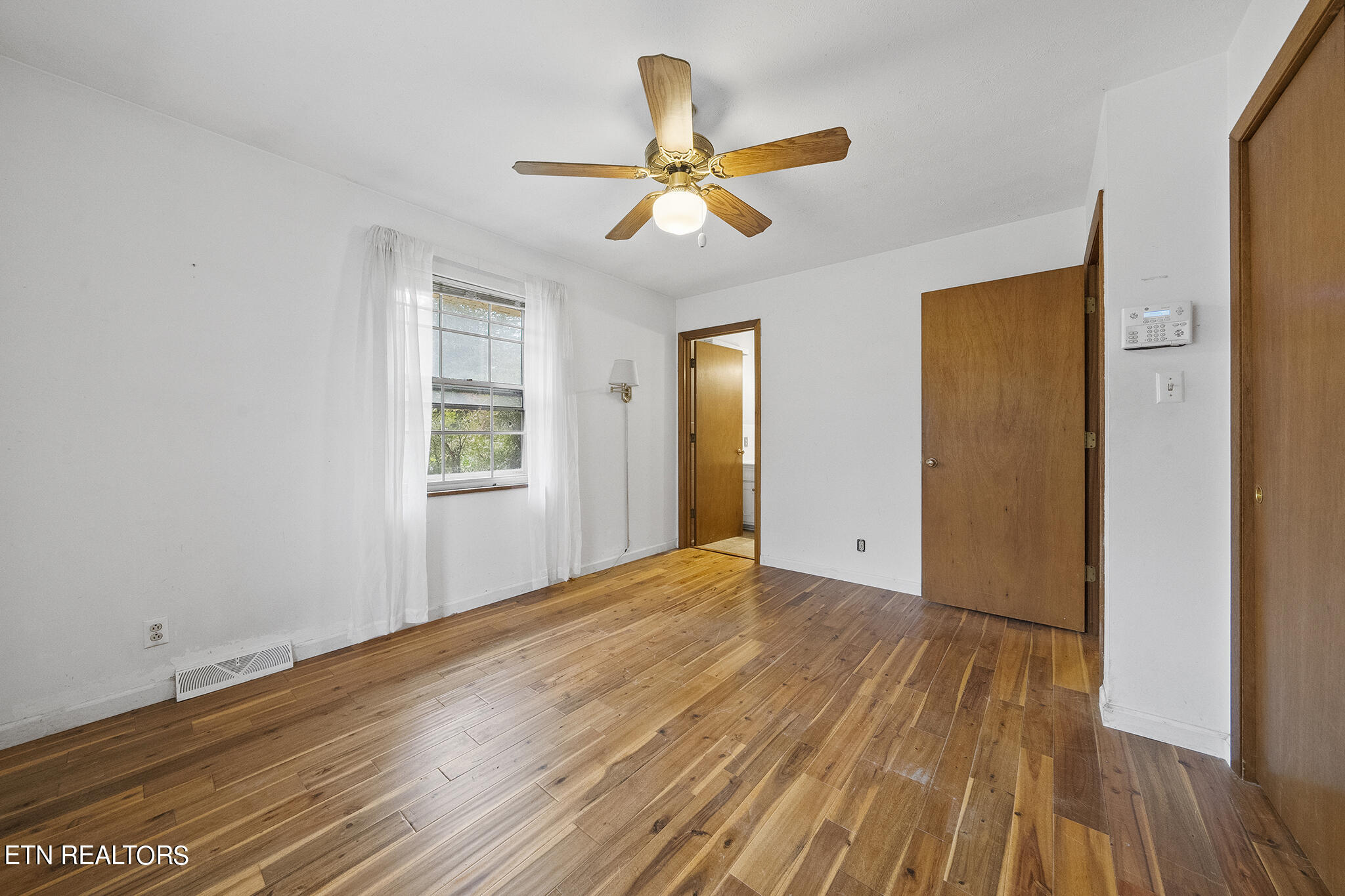9828 Smoky Row Road Strawberry Plains, TN 37871 - Photo 20 of 43 primary bedroom