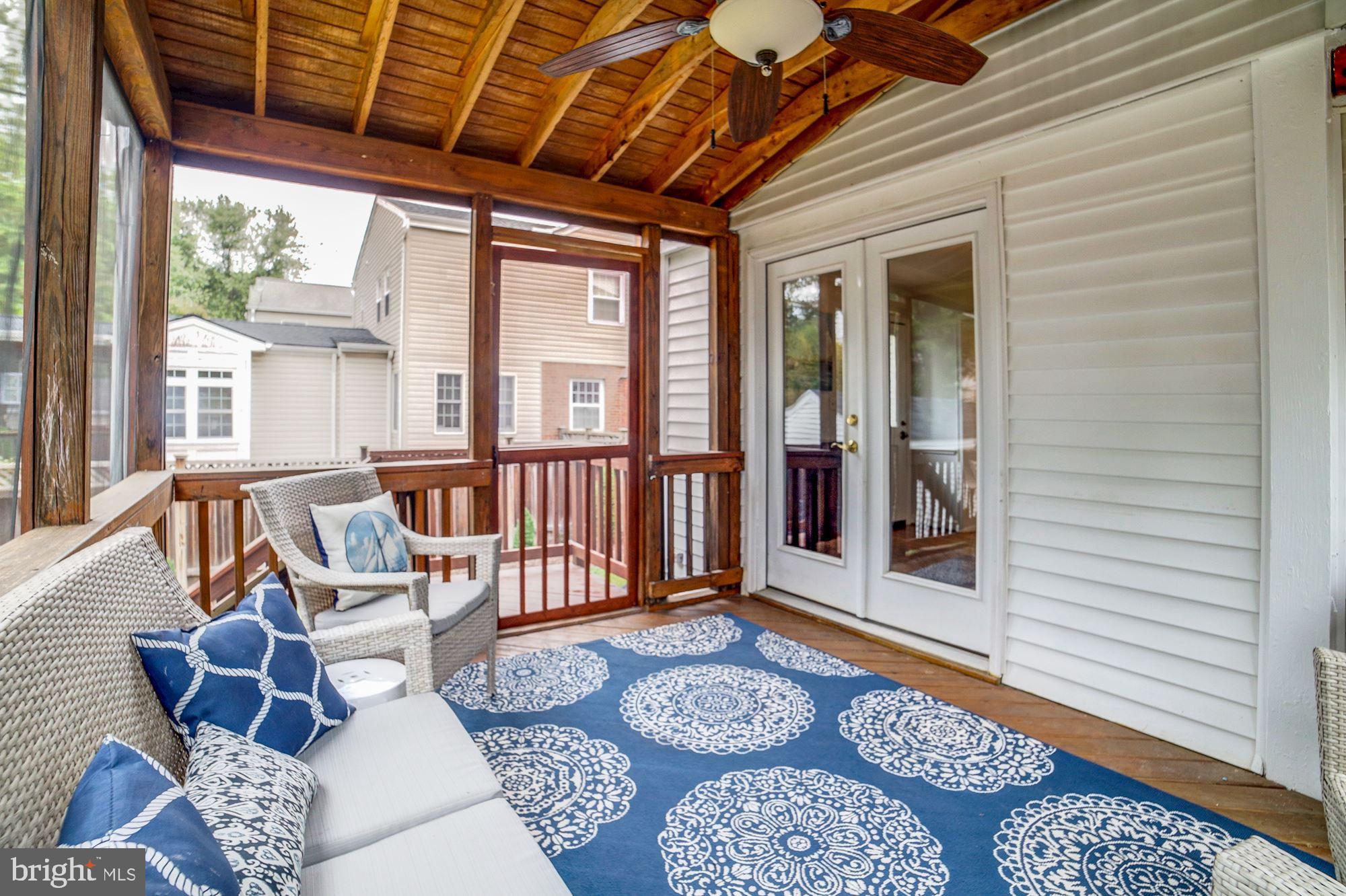 2510 Cameron Mills Road Alexandria, VA 22302 - Photo 11 of 32 3-season screened porch great for entertaining