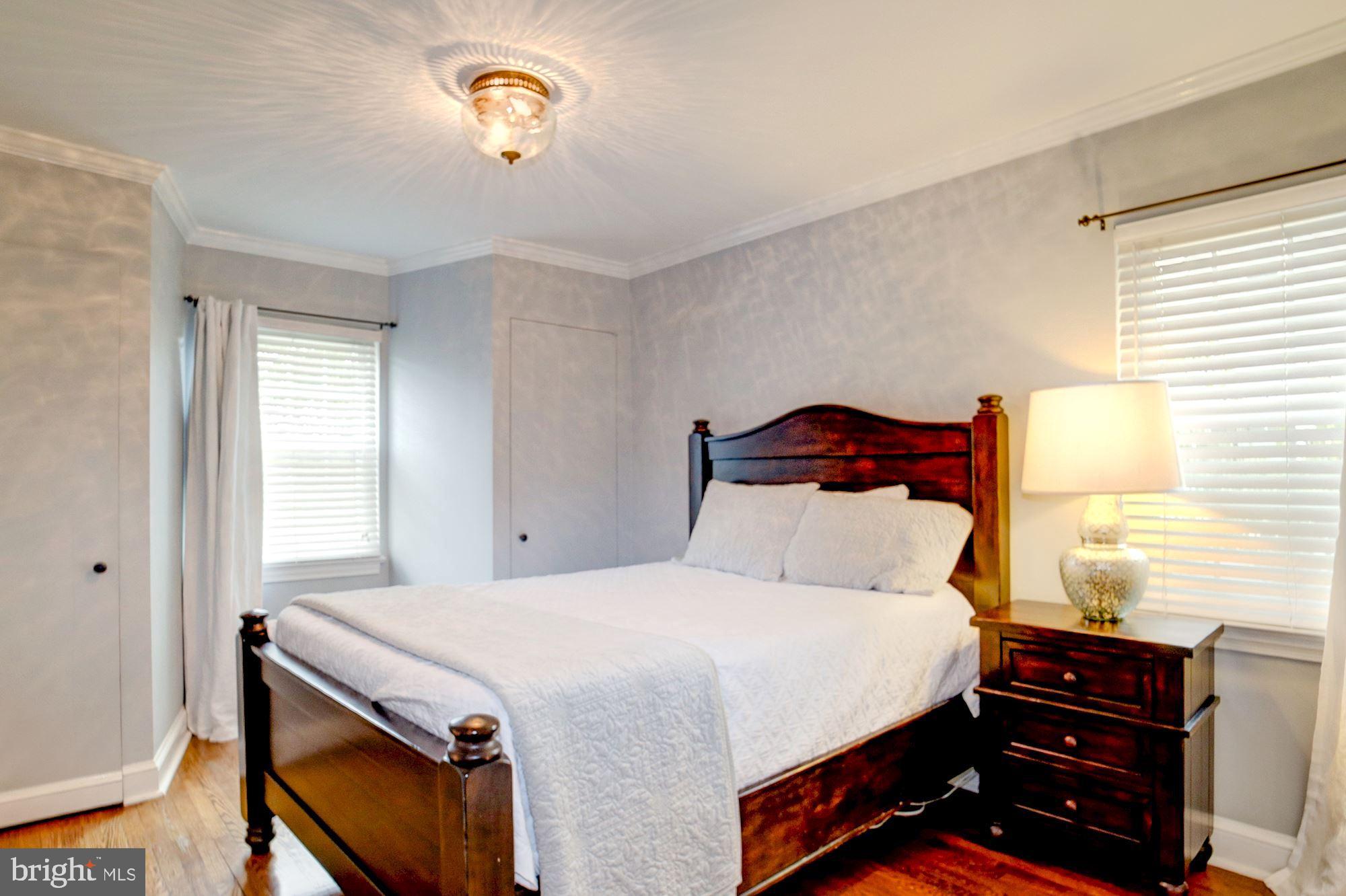 2510 Cameron Mills Road Alexandria, VA 22302 - Photo 14 of 32 Master bedroom with wood floors and ample closets