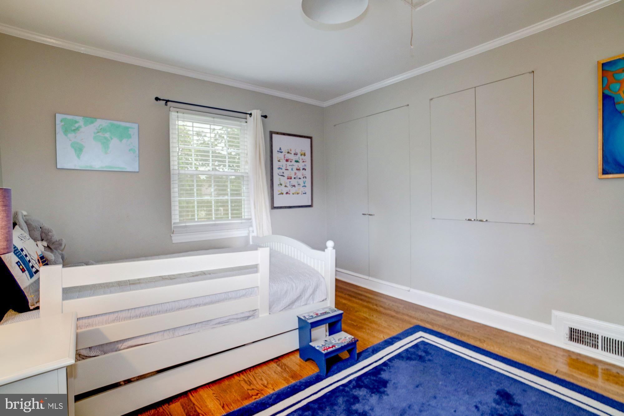 2510 Cameron Mills Road Alexandria, VA 22302 - Photo 17 of 32 Second room w/wood floors and natural lighting