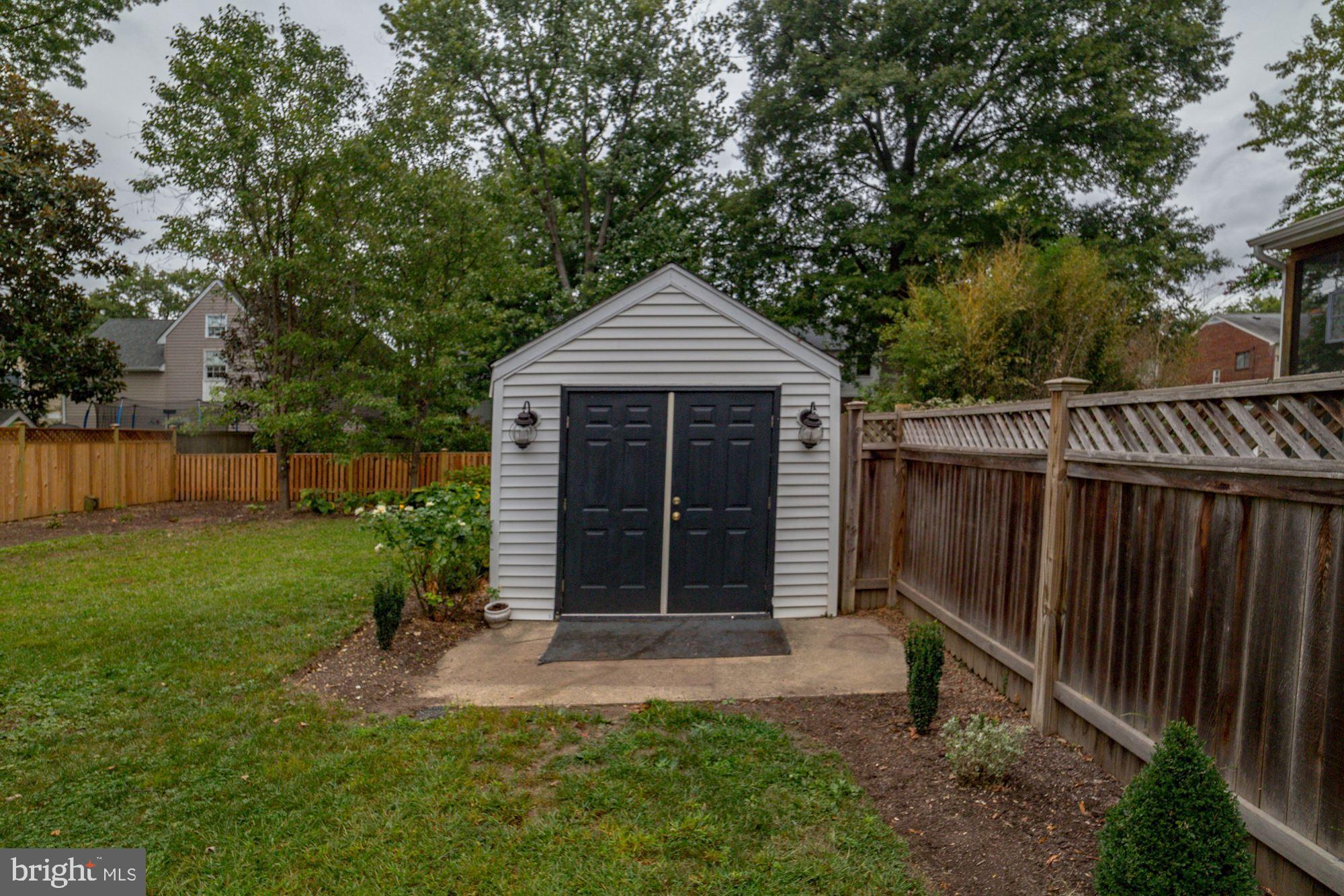 2510 Cameron Mills Road Alexandria, VA 22302 - Photo 28 of 32 Storage shed with lights and electrical outlets