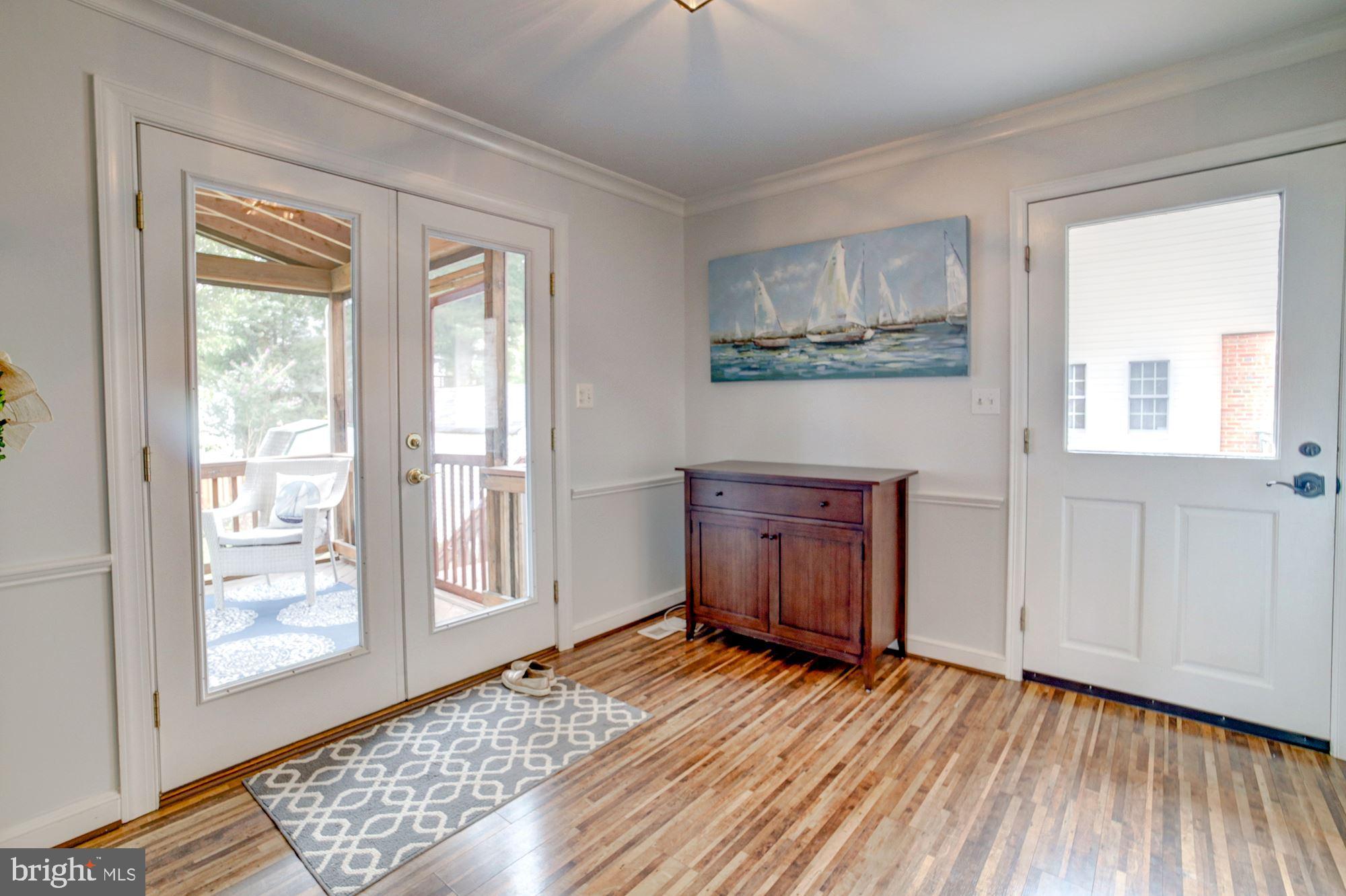 2510 Cameron Mills Road Alexandria, VA 22302 - Photo 10 of 32 Den w/entrance from driveway & screened porch