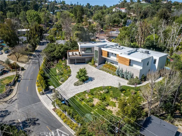 a living room with granite countertop furniture and wooden floor