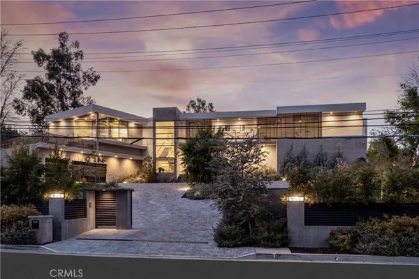 a view of a backyard with a patio