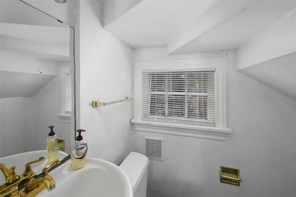 a bathroom with a sink and a bathtub