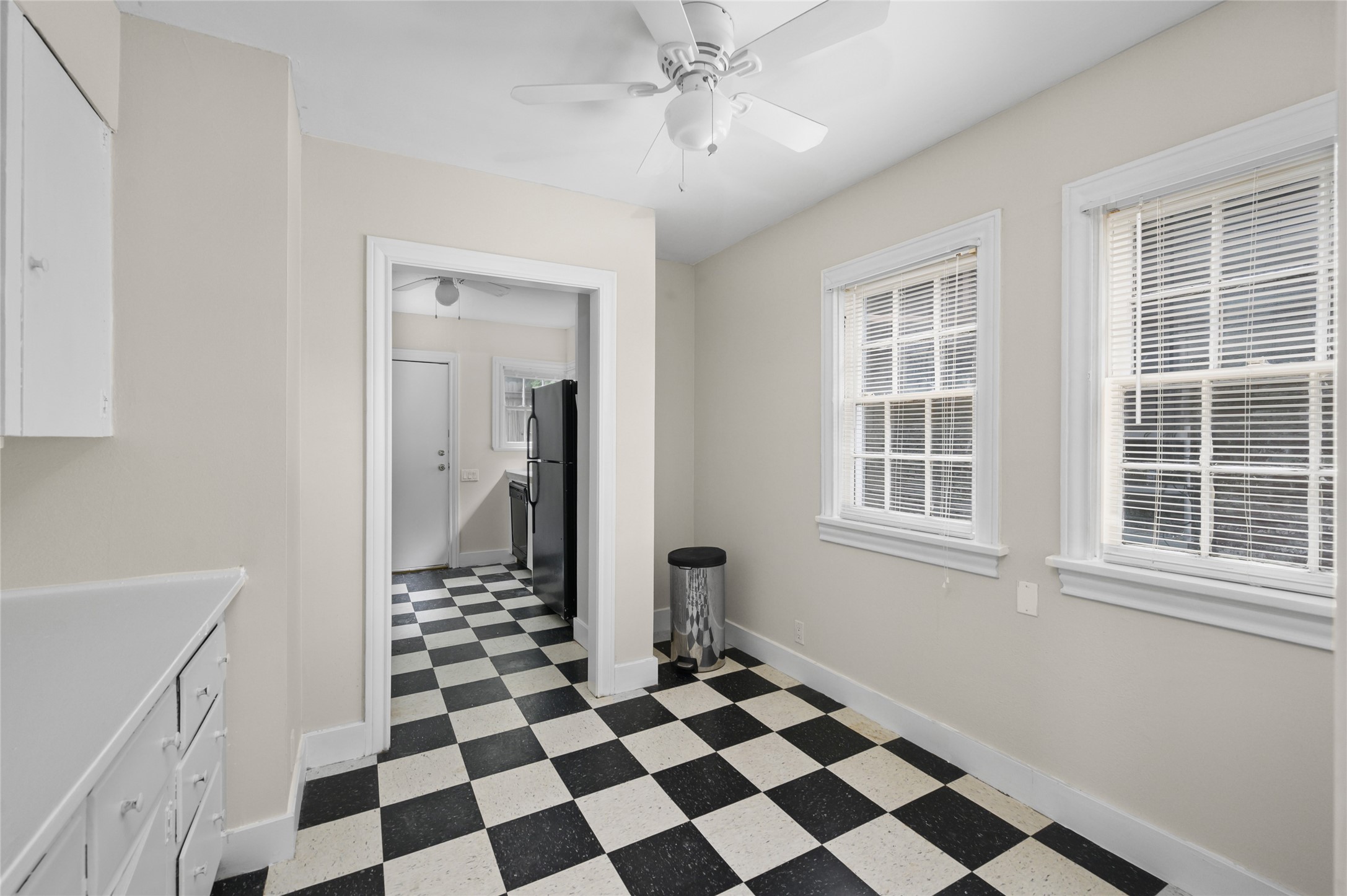 1955 Lexington Street, Unit A Houston, TX 77098 - Photo 8 of 12 a black and white checkered floor with a black white checkered floor