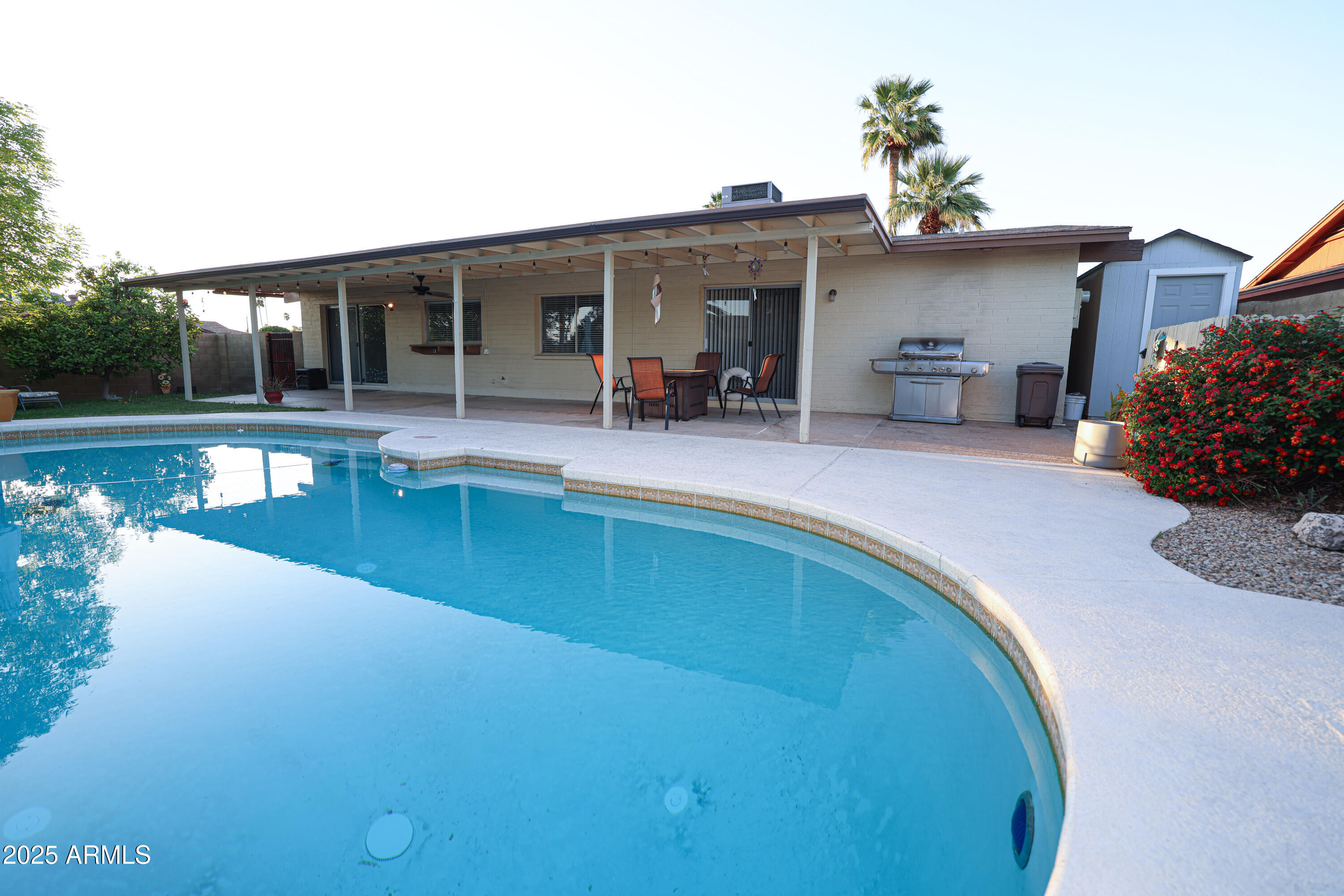 4841 West Mercer Lane Glendale, AZ 85304 - Photo 15 of 15 a view of a house with a patio