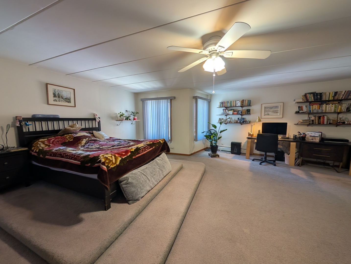 18 East Old Willow Road, Unit 425N Prospect Heights, IL 60070 - Photo 13 of 22 a bedroom with furniture and a chandelier