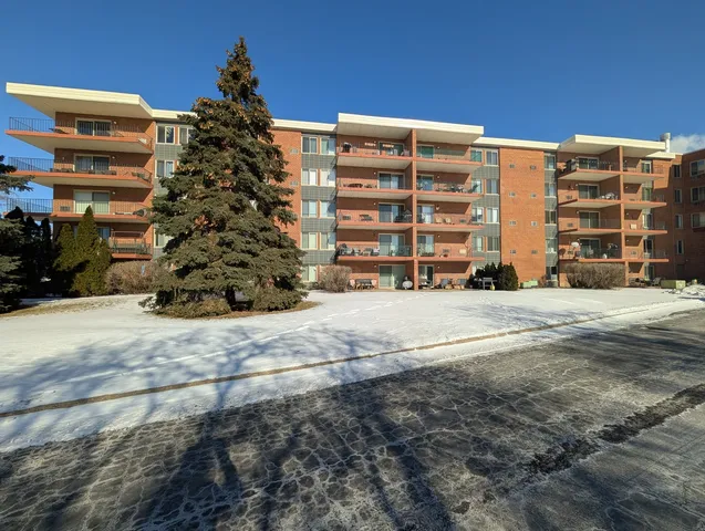 a view of a building with a street