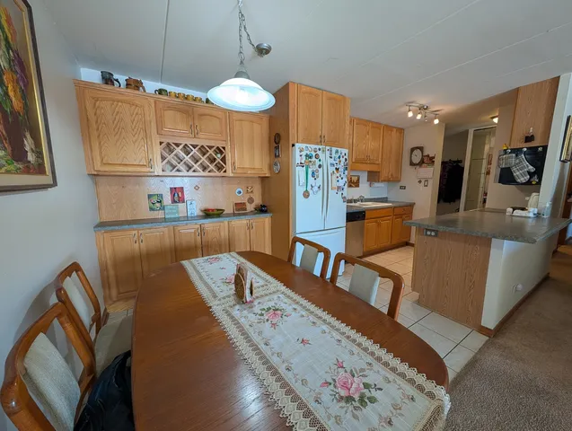 a view of a living room and dining room