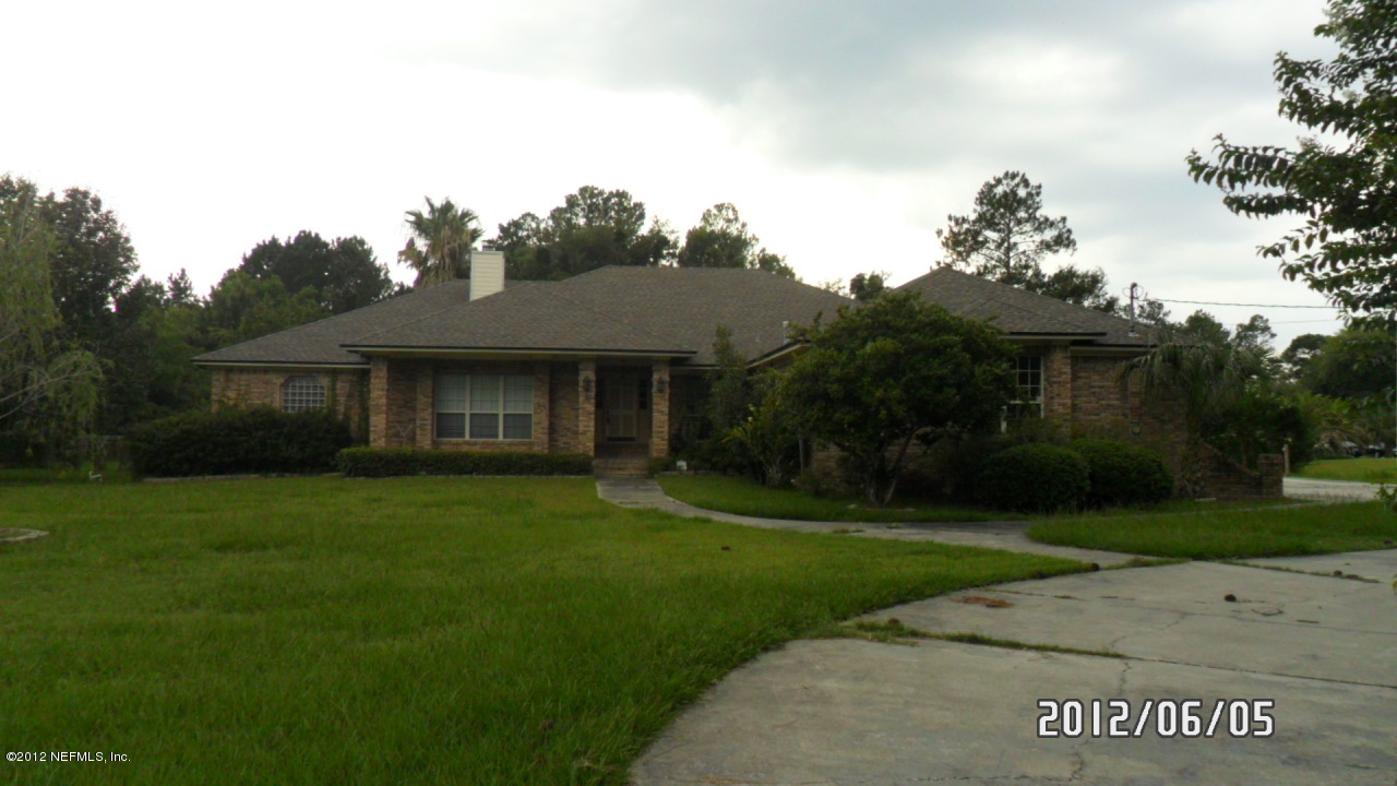 11716 Bridges Road Jacksonville, FL 32218 - Photo 1 of 22 Front Photo w/ New roof