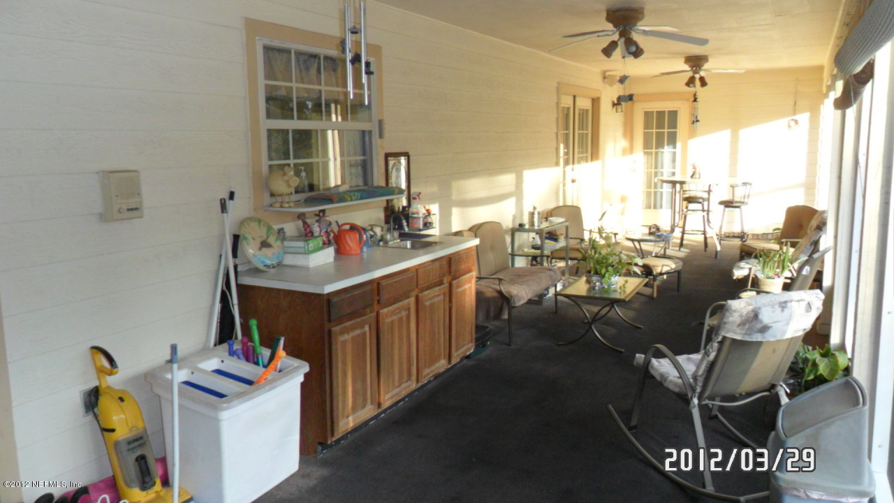 11716 Bridges Road Jacksonville, FL 32218 - Photo 20 of 22 Screened Lanai