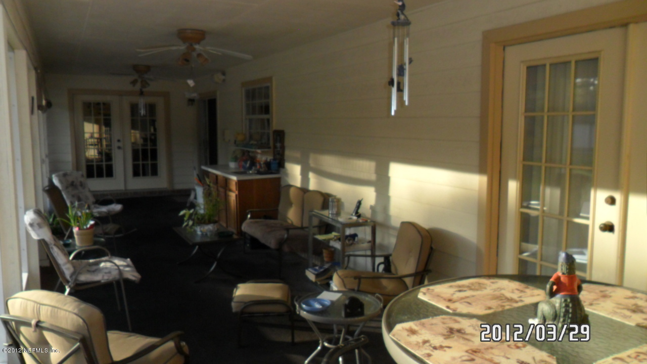11716 Bridges Road Jacksonville, FL 32218 - Photo 21 of 22 Screened Lanai
