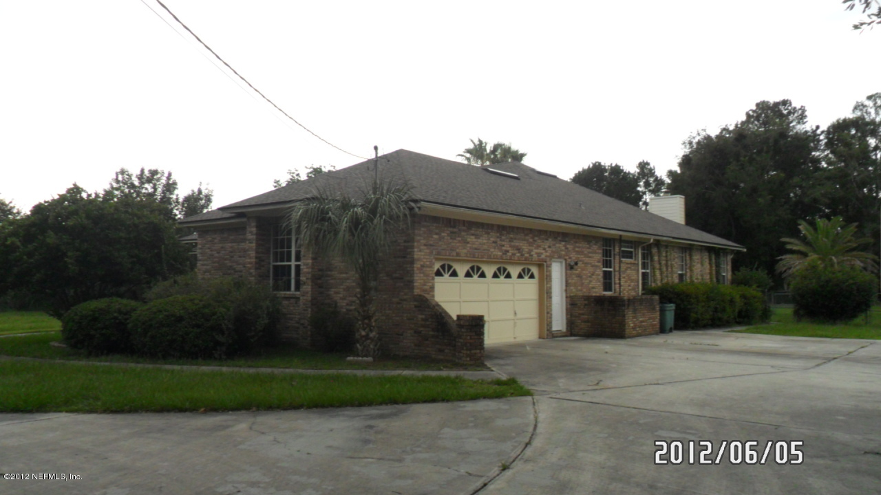 11716 Bridges Road Jacksonville, FL 32218 - Photo 4 of 22 Side / Garage photo w/ new Roof