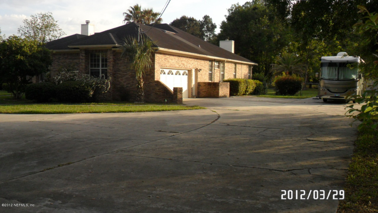 11716 Bridges Road Jacksonville, FL 32218 - Photo 5 of 22 Side Entrance Garage & Extra Parking