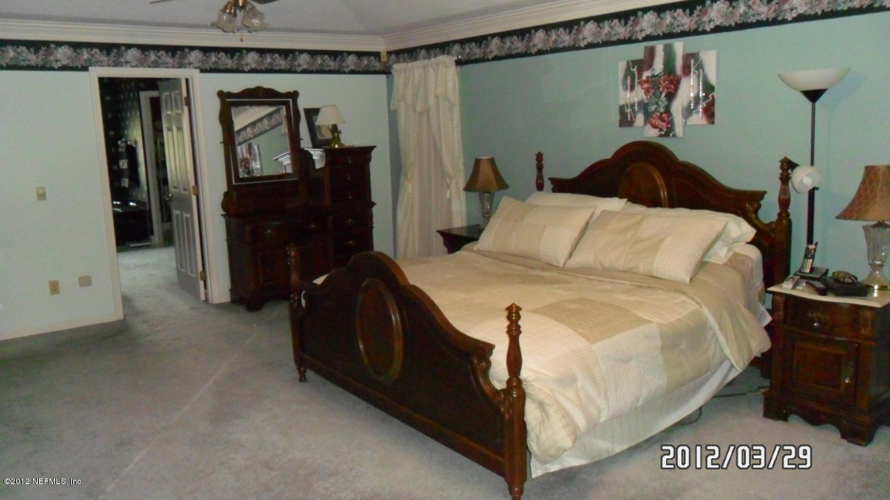 11716 Bridges Road Jacksonville, FL 32218 - Photo 9 of 22 Master Bedrom