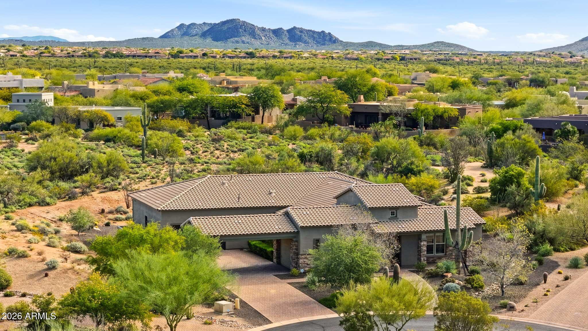 8597 East Arroyo Seco Road Scottsdale, AZ 85266 - Photo 10 of 73 an aerial view of residential houses with outdoor space and ocean view
