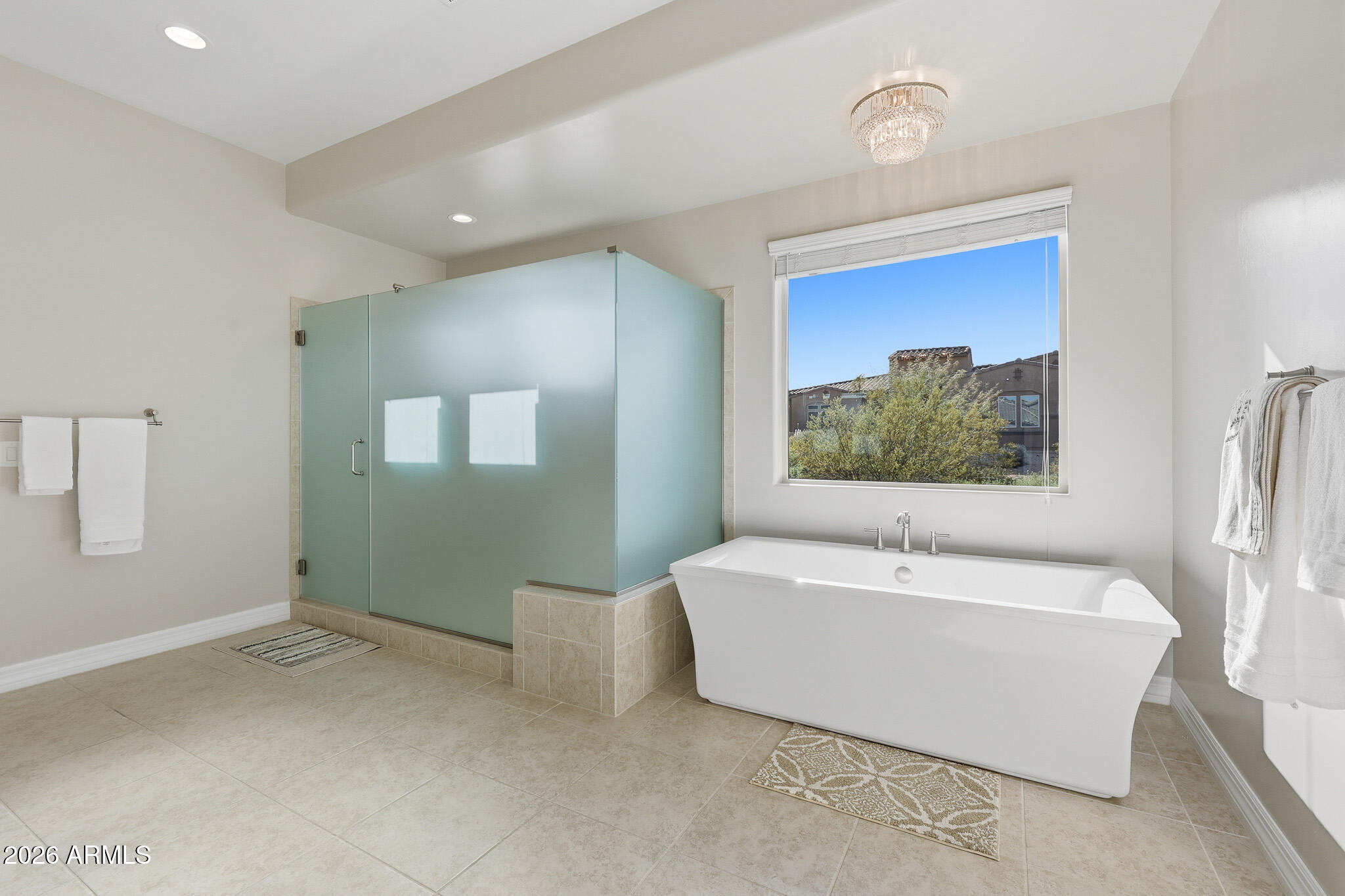 8597 East Arroyo Seco Road Scottsdale, AZ 85266 - Photo 41 of 73 a bathroom with a bathtub and a sink