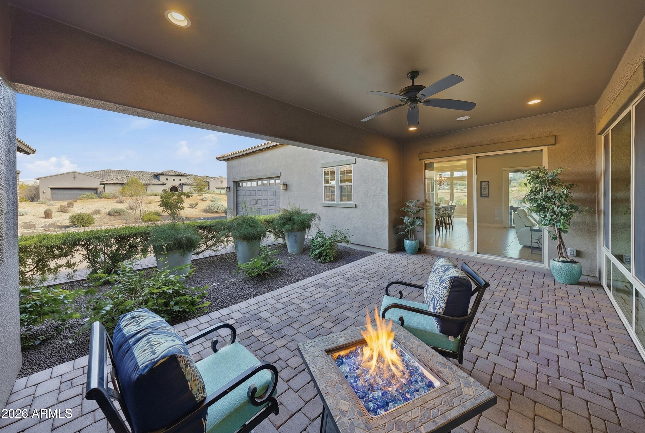 8597 East Arroyo Seco Road Scottsdale, AZ 85266 - Photo 58 of 73 a living room with furniture and a large window