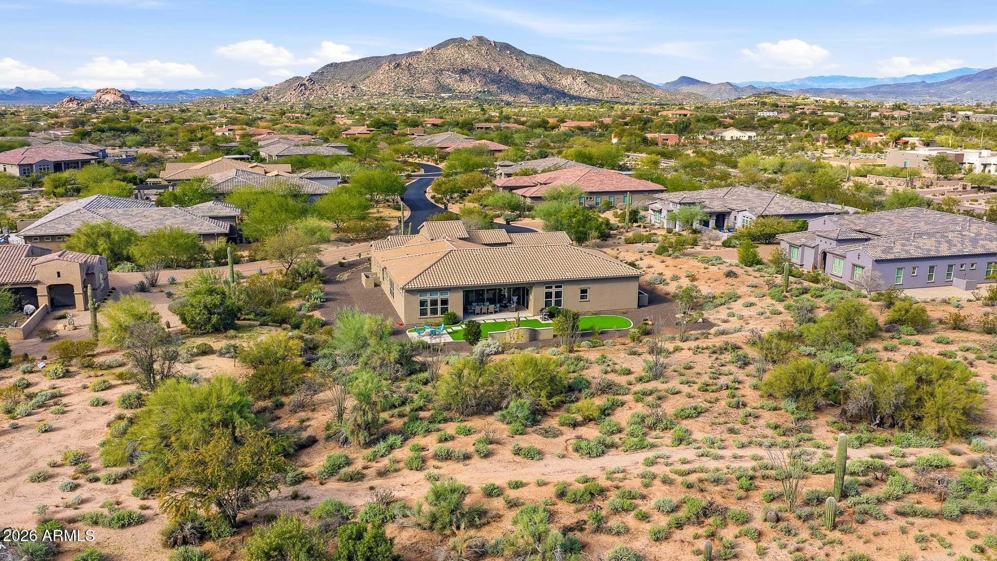 8597 East Arroyo Seco Road Scottsdale, AZ 85266 - Photo 66 of 73 a view of a city with a mountain