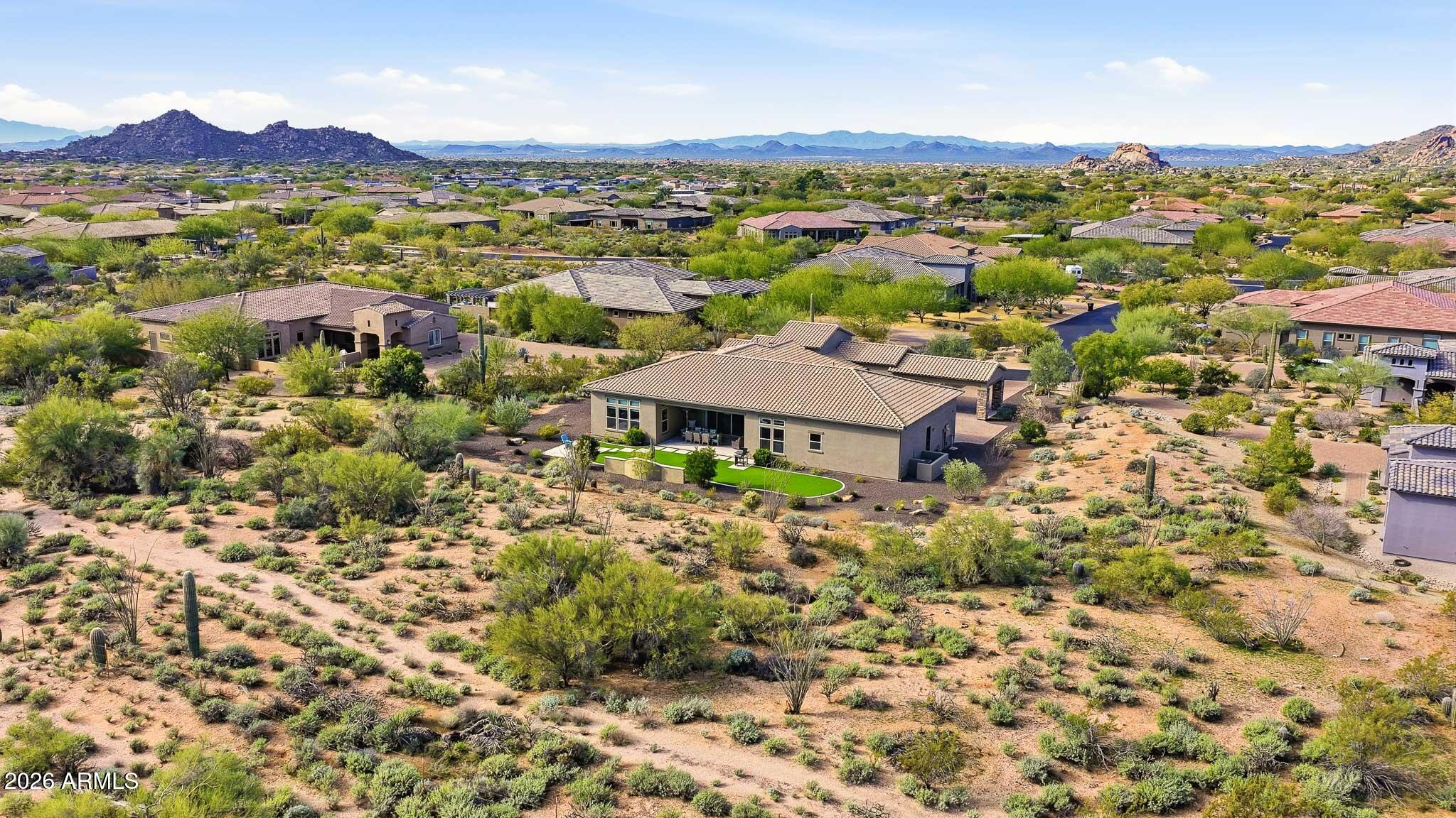 8597 East Arroyo Seco Road Scottsdale, AZ 85266 - Photo 67 of 73 an aerial view of residential house with an outdoor space