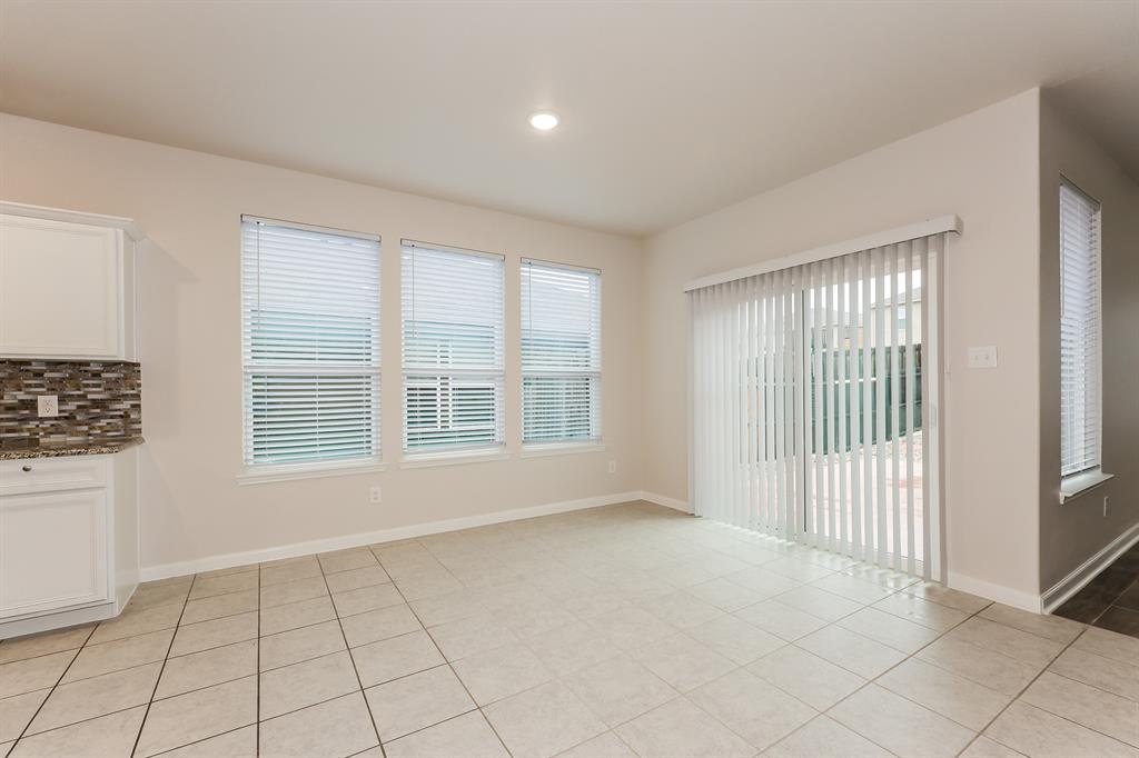 9430 Smoke Tree Drive Forney, TX 75126 - Photo 4 of 17 a view of an empty room with a window